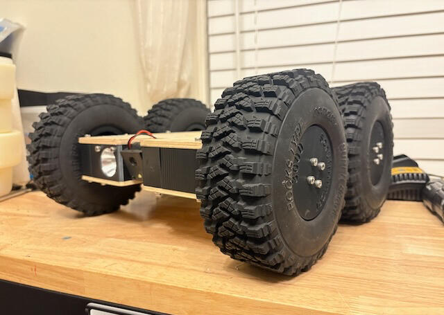 November 2025, the 3rd prototype got 7in wheels, a custom chassis, and the case to watch the live video and send controls was developed.